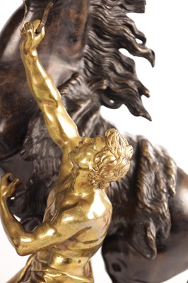 Lot 878 - A LARGE PAIR OF 19TH CENTURY BRONZE AND GILT BRONZE MARLEY HORSES