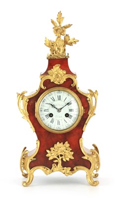 Lot A LATE 19TH CENTURY FRENCH TORTOISESHELL AND ORMOLU MOUNTED MANTEL CLOCK