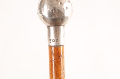 Lot 654 - TWO EARLY 20TH CENTURY SILVER TOPPED MALACCA CANE SWAGGER STICKS