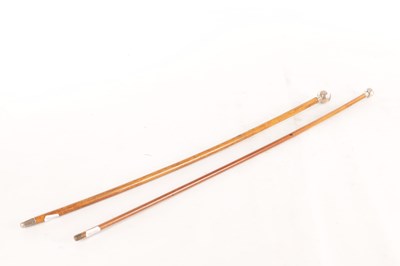 Lot 654 - TWO EARLY 20TH CENTURY SILVER TOPPED MALACCA CANE SWAGGER STICKS