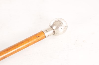 Lot 654 - TWO EARLY 20TH CENTURY SILVER TOPPED MALACCA CANE SWAGGER STICKS
