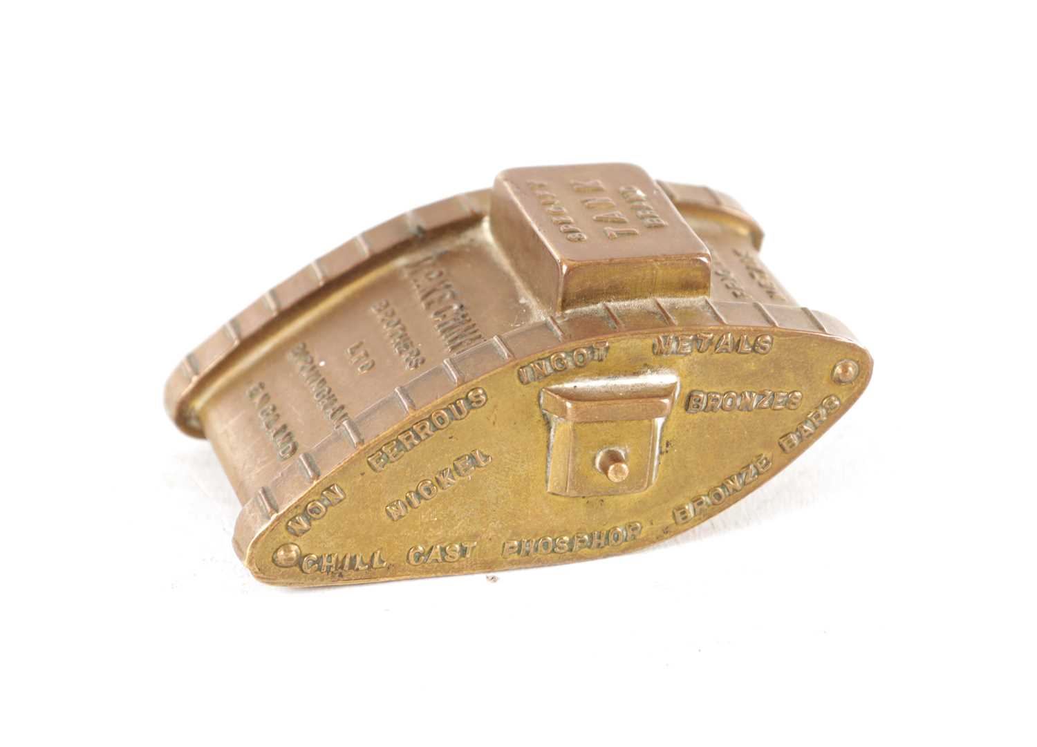 Lot 955 - AN EARLY 20TH CENTURY CAST BRASS PAPER WEIGHT FORMED AS A WORLD WAR I TANK