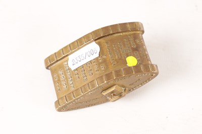Lot 955 - AN EARLY 20TH CENTURY CAST BRASS PAPER WEIGHT FORMED AS A WORLD WAR I TANK