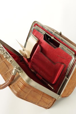 Lot 861 - A VINTAGE CROCODILE LADIES TRAVELING VANITY BAG