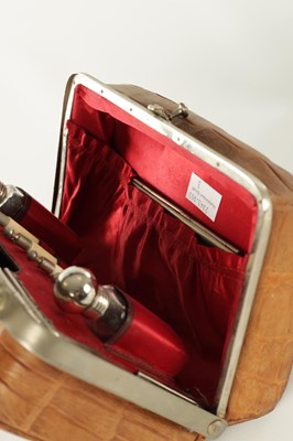 Lot 861 - A VINTAGE CROCODILE LADIES TRAVELING VANITY BAG
