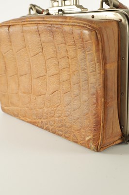 Lot 861 - A VINTAGE CROCODILE LADIES TRAVELING VANITY BAG