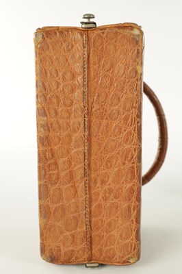 Lot 861 - A VINTAGE CROCODILE LADIES TRAVELING VANITY BAG
