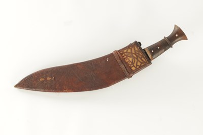 Lot 663 - A 19TH CENTURY NEPALESE MACHETTI WITH LEAF ENGRAVED STEEL BLADE AND RIVETED ROSEWOOD HANDLE