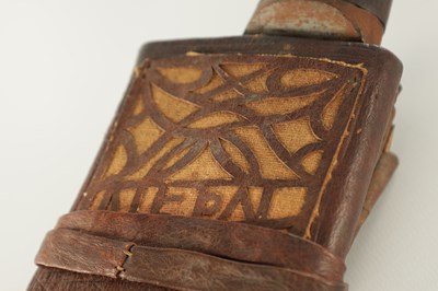 Lot 663 - A 19TH CENTURY NEPALESE MACHETTI WITH LEAF ENGRAVED STEEL BLADE AND RIVETED ROSEWOOD HANDLE