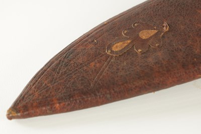 Lot 663 - A 19TH CENTURY NEPALESE MACHETTI WITH LEAF ENGRAVED STEEL BLADE AND RIVETED ROSEWOOD HANDLE