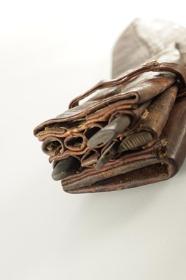 Lot 663 - A 19TH CENTURY NEPALESE MACHETTI WITH LEAF ENGRAVED STEEL BLADE AND RIVETED ROSEWOOD HANDLE