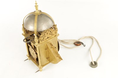 Lot 1480 - HENRY DUN, LONDINI. A 17TH CENTURY WINGED BRASS LANTERN CLOCK