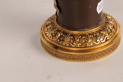 Lot 730 - A PAIR OF REGENCY FRENCH BRONZE AND GILT BRONZE TWO BRANCH CANDELABRA