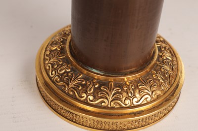 Lot 730 - A PAIR OF REGENCY FRENCH BRONZE AND GILT BRONZE TWO BRANCH CANDELABRA