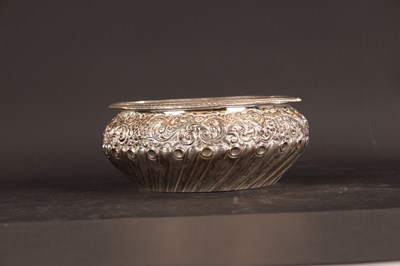 Lot 354 - A 19TH CENTURY EMBOSSED SILVER BOWL