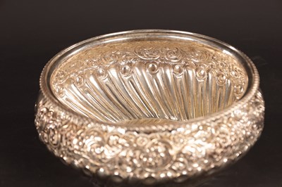 Lot 354 - A 19TH CENTURY EMBOSSED SILVER BOWL