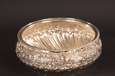 Lot 354 - A 19TH CENTURY EMBOSSED SILVER BOWL