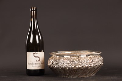 Lot 354 - A 19TH CENTURY EMBOSSED SILVER BOWL
