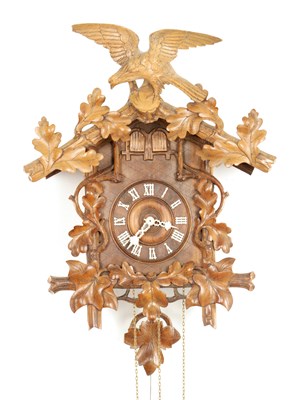 Lot 1322 - A LATE 19TH CENTURY GERMAN BLACK FOREST CARVED LINDEN WOOD THREE TRAIN CUCKOO QUAIL CLOCK