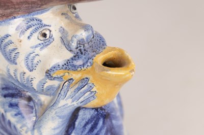 Lot 112 - A 19TH CENTURY DUTCH DELFT TOBY JUG MODELLED AS A MONKEY