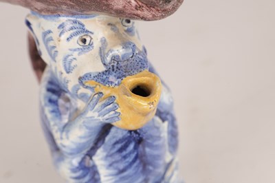 Lot 112 - A 19TH CENTURY DUTCH DELFT TOBY JUG MODELLED AS A MONKEY