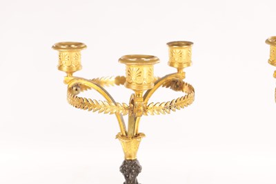 Lot 956 - A STYLISH PAIR OF 19TH CENTURY FRENCH EMPIRE BRONZE AND ORMOLU THREE BRANCH FIGURAL CANDELABRA