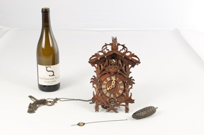 Lot 1582 - A RARE MINIATURE BLACK FOREST JOCLE CUCKOO CLOCK