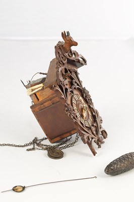 Lot 1582 - A RARE MINIATURE BLACK FOREST JOCLE CUCKOO CLOCK