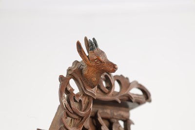 Lot 1582 - A RARE MINIATURE BLACK FOREST JOCLE CUCKOO CLOCK