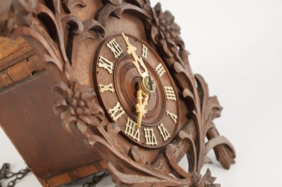 Lot 1582 - A RARE MINIATURE BLACK FOREST JOCLE CUCKOO CLOCK