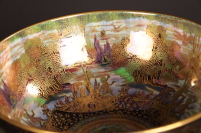 Lot 101 - A FINE WEDGWOOD FAIRYLAND LUSTRE PEDESTAL PUNCHBOWL CIRCA 1920'S DESIGNED BY DAISY MAKEIG-JONES