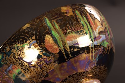 Lot 101 - A FINE WEDGWOOD FAIRYLAND LUSTRE PEDESTAL PUNCHBOWL CIRCA 1920'S DESIGNED BY DAISY MAKEIG-JONES