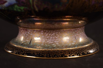Lot 101 - A FINE WEDGWOOD FAIRYLAND LUSTRE PEDESTAL PUNCHBOWL CIRCA 1920'S DESIGNED BY DAISY MAKEIG-JONES