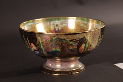 Lot 101 - A FINE WEDGWOOD FAIRYLAND LUSTRE PEDESTAL PUNCHBOWL CIRCA 1920'S DESIGNED BY DAISY MAKEIG-JONES