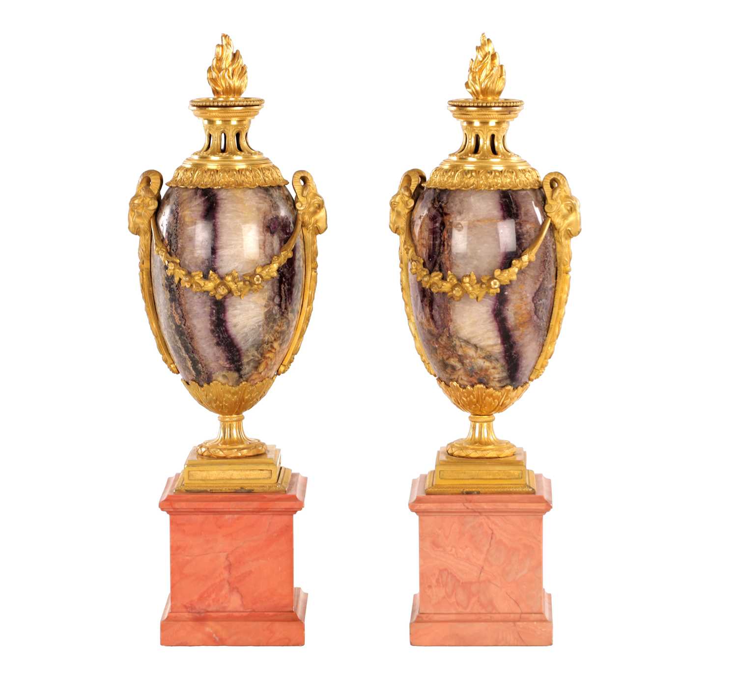 Lot 834 - A FINE PAIR OF LATE GEORGE III ORMOLU AND BLUE JOHN MANTEL URNS/CANDLE HOLDERS ON VEINED PINK MARBLE PEDESTAL BASES ATTRIBUTED TO MATTHEW BOULTON