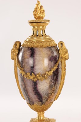 Lot 834 - A FINE PAIR OF LATE GEORGE III ORMOLU AND BLUE JOHN MANTEL URNS/CANDLE HOLDERS ON VEINED PINK MARBLE PEDESTAL BASES ATTRIBUTED TO MATTHEW BOULTON