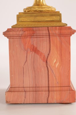 Lot 834 - A FINE PAIR OF LATE GEORGE III ORMOLU AND BLUE JOHN MANTEL URNS/CANDLE HOLDERS ON VEINED PINK MARBLE PEDESTAL BASES ATTRIBUTED TO MATTHEW BOULTON