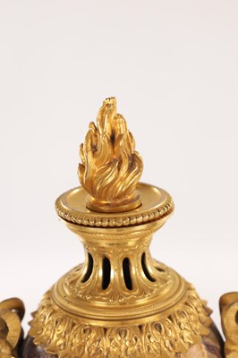 Lot 834 - A FINE PAIR OF LATE GEORGE III ORMOLU AND BLUE JOHN MANTEL URNS/CANDLE HOLDERS ON VEINED PINK MARBLE PEDESTAL BASES ATTRIBUTED TO MATTHEW BOULTON