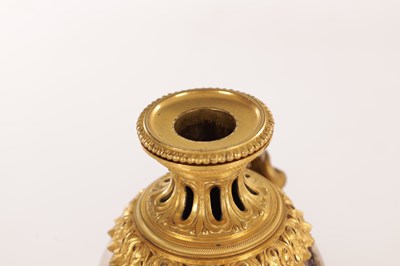 Lot 834 - A FINE PAIR OF LATE GEORGE III ORMOLU AND BLUE JOHN MANTEL URNS/CANDLE HOLDERS ON VEINED PINK MARBLE PEDESTAL BASES ATTRIBUTED TO MATTHEW BOULTON