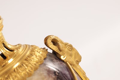 Lot 834 - A FINE PAIR OF LATE GEORGE III ORMOLU AND BLUE JOHN MANTEL URNS/CANDLE HOLDERS ON VEINED PINK MARBLE PEDESTAL BASES ATTRIBUTED TO MATTHEW BOULTON