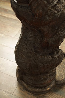 Lot 1141 - A RARE 19TH CENTURY BLACK FOREST CARVED LINDEN WOOD STICK STAND MODELLED AS A BEGGING DOG
