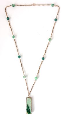 Lot 140 - A GOLD AND JADE NECKLACE AND PENDANT the...