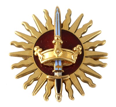 Lot 141 - A 9ct GOLD AND ENAMEL MILITARY BADGE formed as...