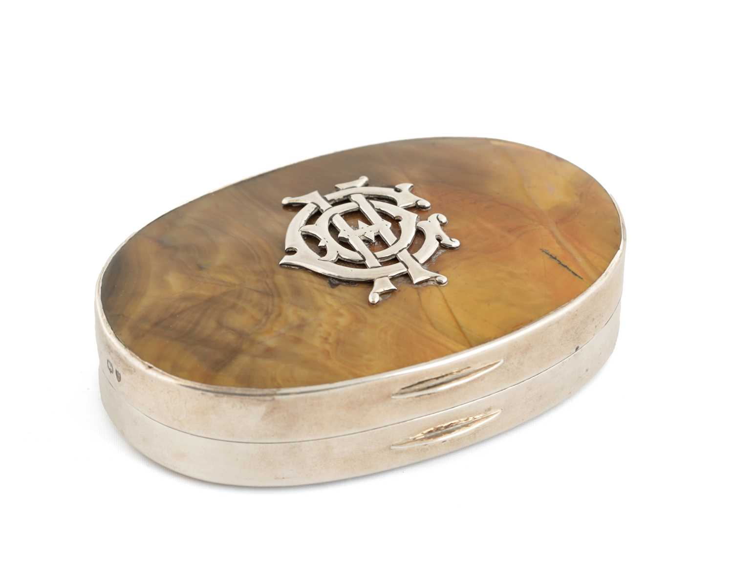 Lot 325 - A LARGE EDWARD VII SILVER AND HARD STONE OVAL SNUFF BOX