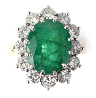 Lot 149 - A LADIES 18ct YELLOW AND WHITE GOLD EMERALD...