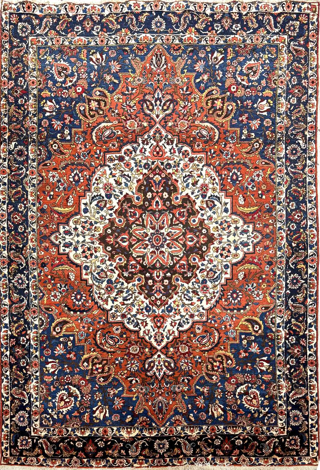 Lot 938 - A LARGE PERSIAN KASHAN RUG