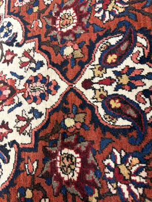 Lot 938 - A LARGE PERSIAN KASHAN RUG