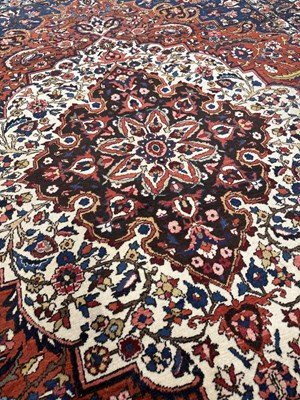 Lot 938 - A LARGE PERSIAN KASHAN RUG