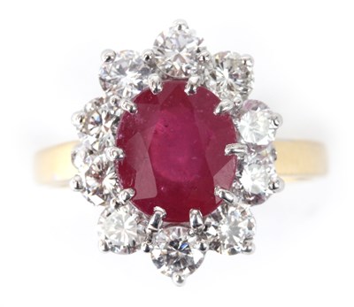 Lot 156 - A LADIES 18ct YELLOW AND WHITE GOLD RUBY AND...