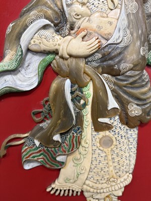 Lot 204 - A SET OF FOUR LATE 19TH CENTURY CHINESE LACQUERED PANELS WITH IVORY AND MOTHER OF PEARL INLAID FIGURES OF WARRIORS